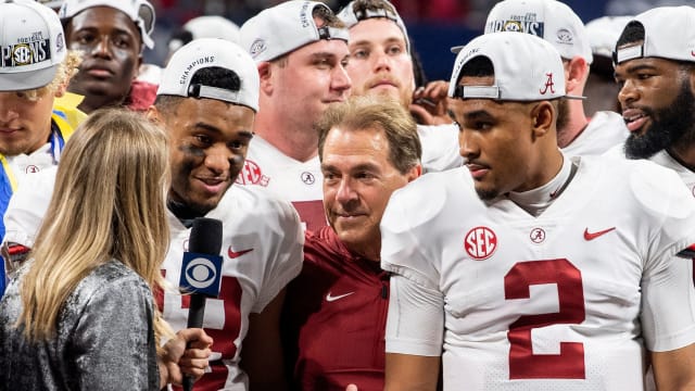 Alabama quarterback Tua Tagovailoa (13), head coach Nick Saban and quarterback Jalen Hurts (2) are interviewed after winning the SEC Championship Game at Mercedes Benz Stadium in Atlanta, Ga., on Saturday December 1, 2018.